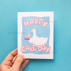 Carte d'anniversaire de canard heureux | Joli canard portant un gâteau, Adorable carte d'animaux pour des occasions spéciales et des anniversaires, Esthétique pastel