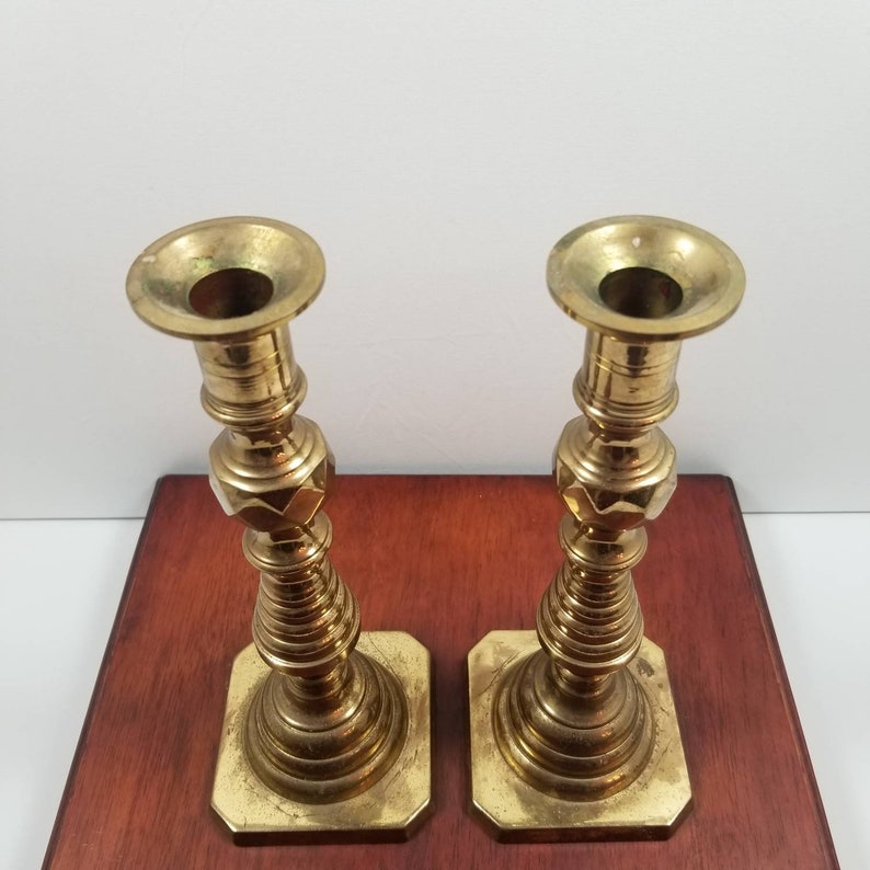 Antique pair of late 19th century beehive pushup brass candlesticks brass candlesticks