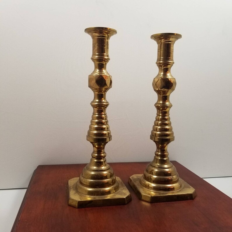 Antique pair of late 19th century beehive pushup brass candlesticks brass candlesticks