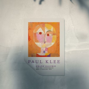May include: A poster advertising an exhibition of artwork by Paul Klee at the Grand Galerie, Rue de l'Universite, from May to July 1955. The poster features a colorful abstract painting of a face.