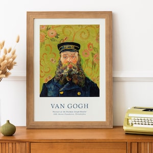 May include: A framed print of a painting by Vincent van Gogh titled "Portrait of the Postman Joseph Roulin." The painting depicts a man with a beard wearing a blue coat and a cap. The background is a green and yellow floral pattern.