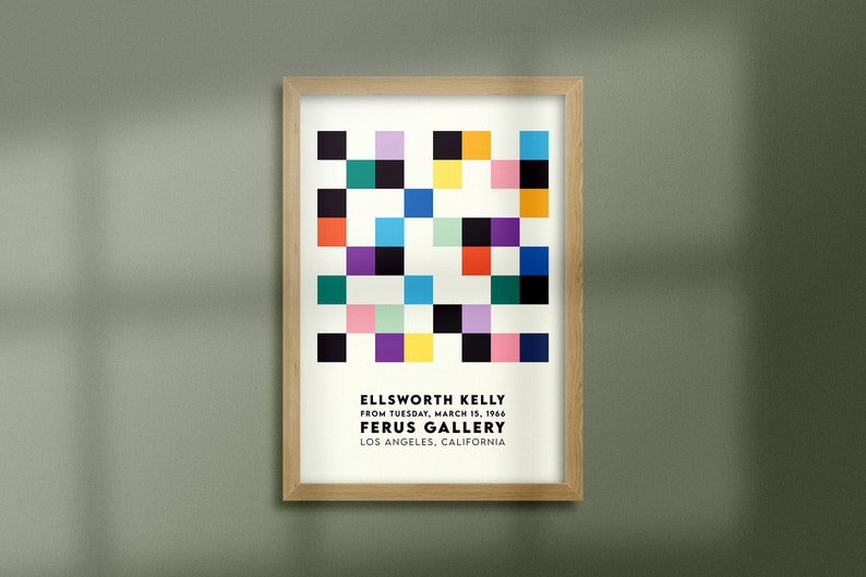 May include: A framed poster with a colorful geometric design in shades of red, blue, green, yellow, purple, and pink. The poster is titled "ELLSWORTH KELLY" and includes the text "FROM TUESDAY, MARCH 15, 1966 FERUS GALLERY LOS ANGELES, CALIFORNIA."