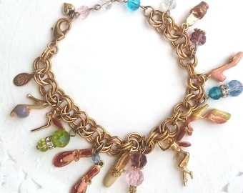Kirks folly vintage whimsical charm bracelet. Stunning  and very quirky with an abundance of charms, very collectable.