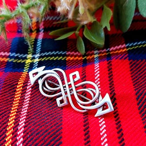 Ola Marie Gorie Scottish Brooch/Pin. Solid silver beautifully crafted,  and symbolizing eternity and infinity. Perfect keepsake