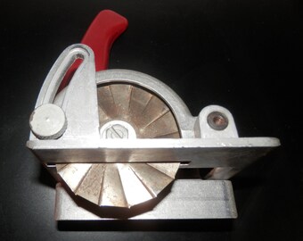 Firth Cleveland Surform drill attachment for cutting and slotting, made in England, cast aluminum, steel cutter blade. An unusual tool.