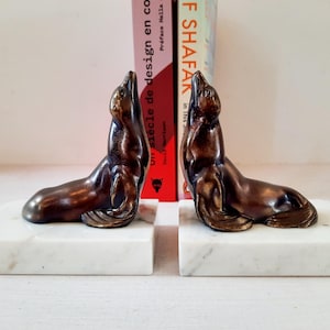 French 1930&#39;s Art Deco Seal Bookends set on a White Marble Base, Collectable Art Deco Bookends