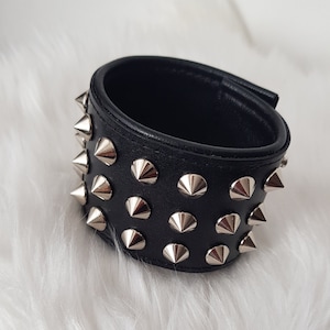 Spiked Leather Cuff Bracelet: Wristband with glossing studded metal spikes Rocker singer accessory