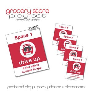 May include: A set of red and white "drive up" signs for a grocery store play set. The signs include the text "Space 1", "Space 2", "Space 3", and "Space 4". The signs also include the text "Enter space number in app".
