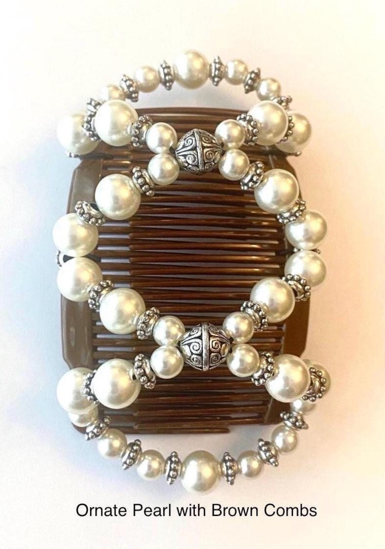 May include: Ornate hair comb featuring faux pearls and silver-toned accents. The comb is brown and has multiple rows of teeth. The text "Ornate Pearl with Brown Combs" is at the bottom of the image.