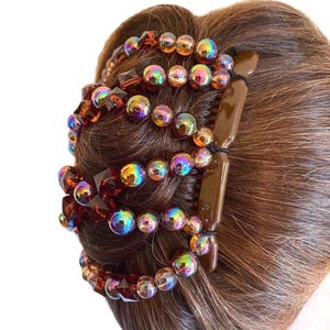 Amberkleurige iriserende tweekam elastische haarspeld met kralen, paardenstaart- en knotmaker, sterke kammen en elastiek. Handgemaakt in het Verenigd Koninkrijk