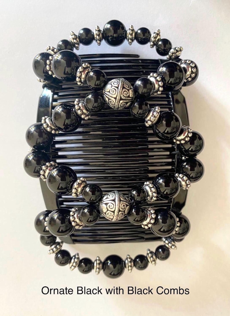 May include: Ornate black hair combs with black beads and silver accents. The combs feature large, glossy black beads and smaller silver-toned beads. The text "Ornate Black with Black Combs" is at the bottom of the image.