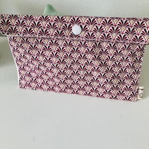 Plum and golden fabric pouch