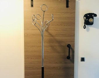 BLACK FASE Standing coat rack from from the 70s  Colors: Black - Materials Chrome & Metal
