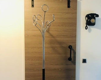BLACK FASE Standing coat rack from from the 70s  Colors: Black - Materials Chrome & Metal