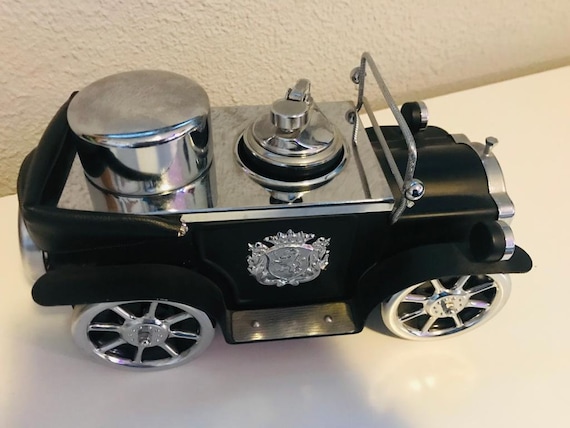 cigarette dispenser car Deluxe Auto Case with Built-In Lighter Bewild Cigarette-dispensing car accessory from the