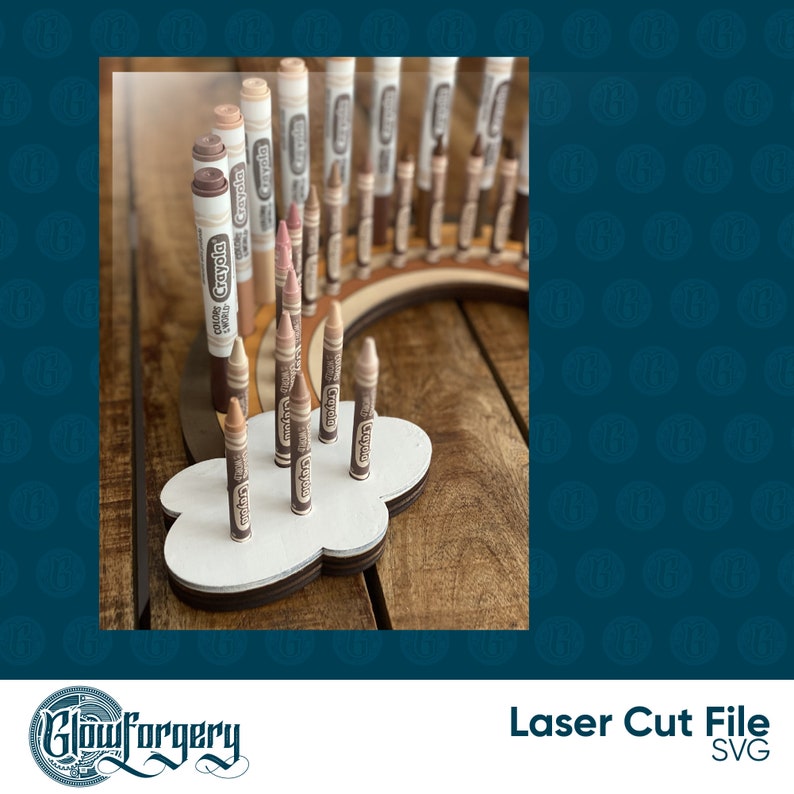 May include: A wooden rainbow-shaped stand with a cloud-shaped base holds a collection of brown Crayola crayons. The crayons are arranged in a rainbow pattern, with the darkest brown crayons at the bottom and the lightest brown crayons at the top.