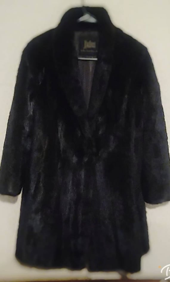 Stunning, mink fur by Koslow's. Glossy and a stand