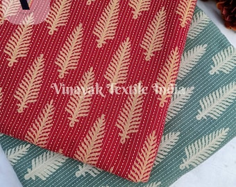 May include: Two pieces of fabric with a leaf pattern. The top fabric is red with gold leaves. The bottom fabric is teal with white leaves. The text "ctnf002" is visible in the bottom left corner.