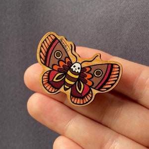 Wooden death’s head moth pin