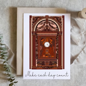 Puede incluir: Tarjeta de felicitación con una ilustración detallada de un reloj dentro de un marco ornamentado, en tonos marrones, rojos y beige. La tarjeta incluye el texto manuscrito "Make each day count" en la parte inferior. La tarjeta está sobre un fondo neutro.