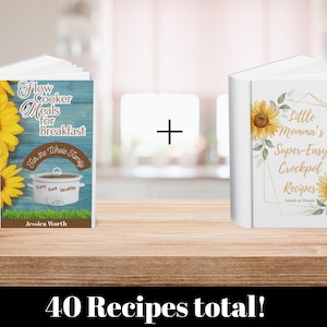 May include: Two cookbooks on a wooden surface. One book has a blue cover with a sunflower and the text "Slow Cooker Meals for Breakfast". The other book has a white cover with sunflowers and the text "Little Momma's Super-Easy Crockpot Recipes". The text "40 Recipes total!" is at the bottom.