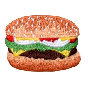 May include: Embroidered patch of a hamburger with a sesame seed bun, lettuce, tomato, cheese, and a beef patty.