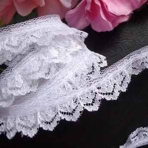 Ruffled Lace, 5/8  inch wide white or ivory color selling by the yard