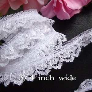 Ruffled Lace, 5/8  inch wide white or ivory color selling by the yard