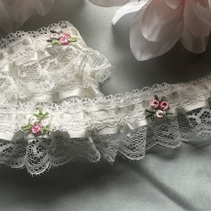 2 inch wide ivory color with pink roses ruffled lace trim price per yard