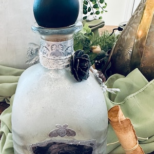 Botella decorada con el patrón de plata