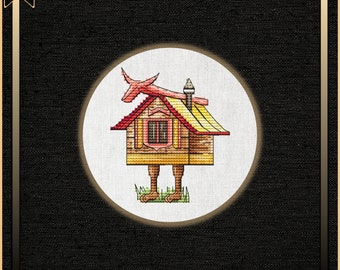 The scheme of cross-stitching an unusual toy for the Christmas tree, embroidery of the hut of Baba Yaga 1