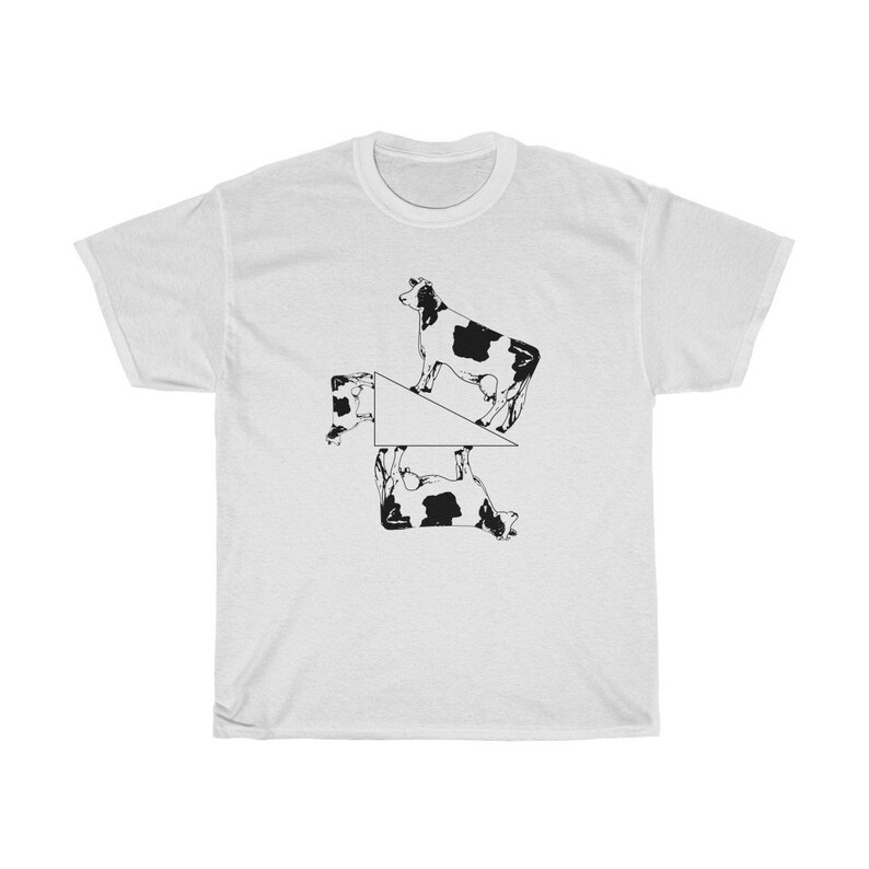May include: White t-shirt with a black and white graphic of four cows arranged in a geometric pattern.
