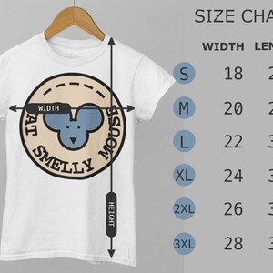 May include: White t-shirt with a beige circle graphic featuring a blue cartoon mouse and the text "Eat Smelly Mouse". Size chart with measurements in inches for sizes S through 3XL.
