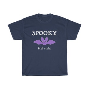 May include: Navy blue t-shirt with a purple bat graphic and the text "SPOOKY but cute".
