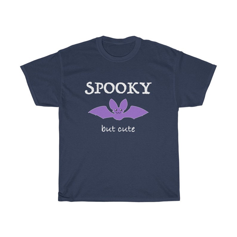 May include: Navy blue t-shirt with a purple bat graphic and the text "SPOOKY but cute".