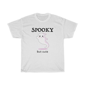 May include: White t-shirt with a black graphic of a cartoon ghost and the text "SPOOKY but cute".
