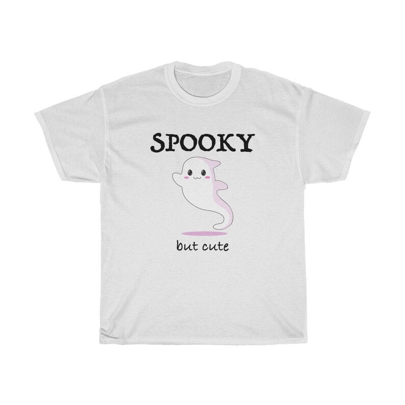 May include: White t-shirt with a black graphic of a cartoon ghost and the text "SPOOKY but cute".