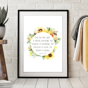 May include: A framed print with a white background and a yellow floral wreath. The wreath surrounds a quote that reads "God the Holy Spirit is Himself, personally, the Imparter of knowledge, the Instructor of youth, the Inspirer of genius." The quote is attributed to "Chudebn".