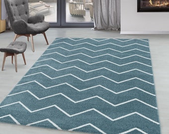 Bajo la alfombra pelo de la alfombra azul olas las líneas de diseño para niños