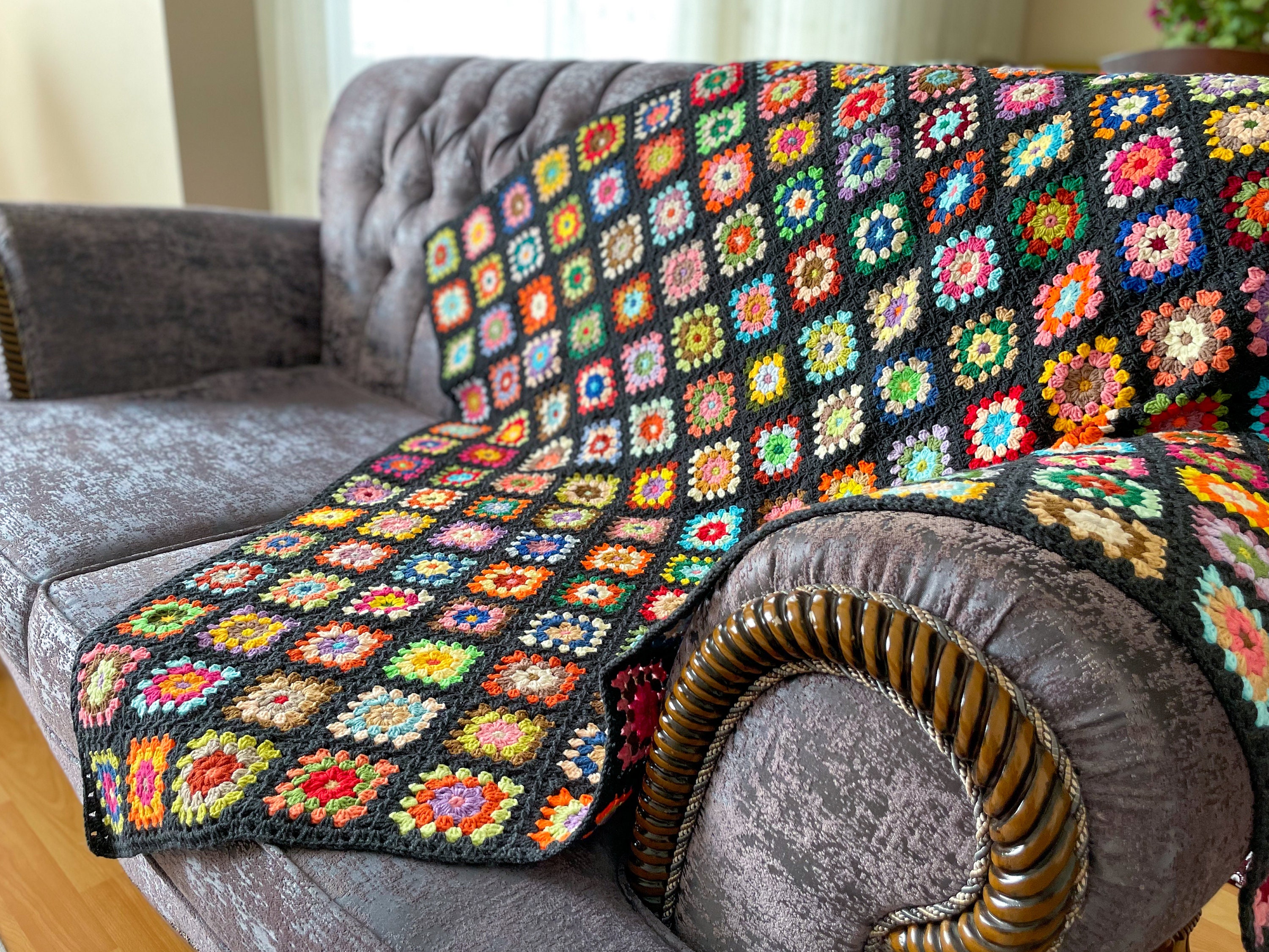 クロシェ編みのデイジーブランケット：カラフルなおばあちゃんの