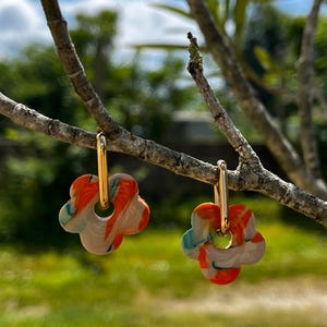 hoop earrings with interchangeable tassels