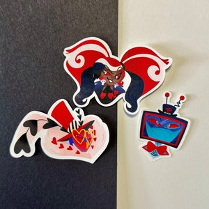 Stickers brillants pour hôtel Hazbin | Fanart mignon inspiré par Hazbin Hotel Vox, Valentino, Velvette « The Vees »