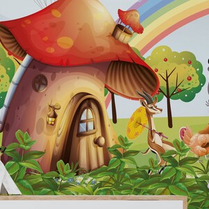 May include: A whimsical mushroom house with a red roof and brown walls, surrounded by green trees and bushes. A small deer with antlers holds an umbrella, and a rainbow arches over the scene.