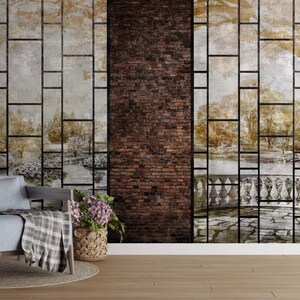 Może przedstawiać: Wnętrze salonu z ceglaną ścianą, na kt&oacute;rej znajduje się tapeta z czarnym wzorem siatki i wyblakłym obrazem sceny ogrodowej. Przed ścianą stoi niebieski fotel z pledową narzutą. W pokoju znajduje się r&oacute;wnież doniczkowa roślina i lampa stojąca.