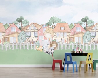 May include: A watercolor illustration of a giraffe, elephant, fox, raccoon, and lion standing in front of a row of houses with picket fences. The illustration is printed on a wall mural. There are four chairs and a table in front of the mural.
