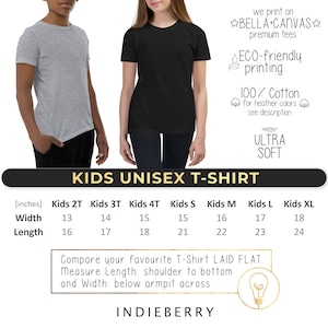 May include: Two children wearing gray and black unisex t-shirts. The image includes size charts with measurements in inches for kids' sizes 2T to XL. Text on the image says "KIDS UNISEX T-SHIRT", "BELLA+CANVAS premium tees", and "ECO-friendly printing".