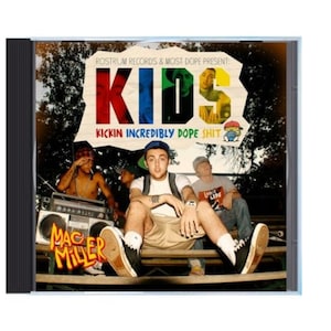 May include: CD case featuring the album "KIDS" by Mac Miller. The cover art displays the album title in bold, colorful letters with the text "Kickin Incredibly Dope Shit." The image includes a group of people sitting on a bench.