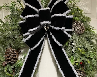 Large black velvet Christmas bow with white fluffy edges and silver jingle bells for wreath, tree topper, garland or gift bow. FREE POSTAGE.