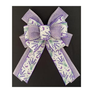 Purple and white Spring Wreath decor. Lavender and butterfly patterned burlap bow with metal hanging loop and FREE POSTAGE in UK