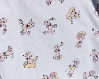 Flannel with pink poodles on a white background